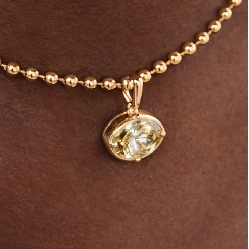East west 4.50 CT Oval cut Bezel set yellow moissanite pendant | WOKE