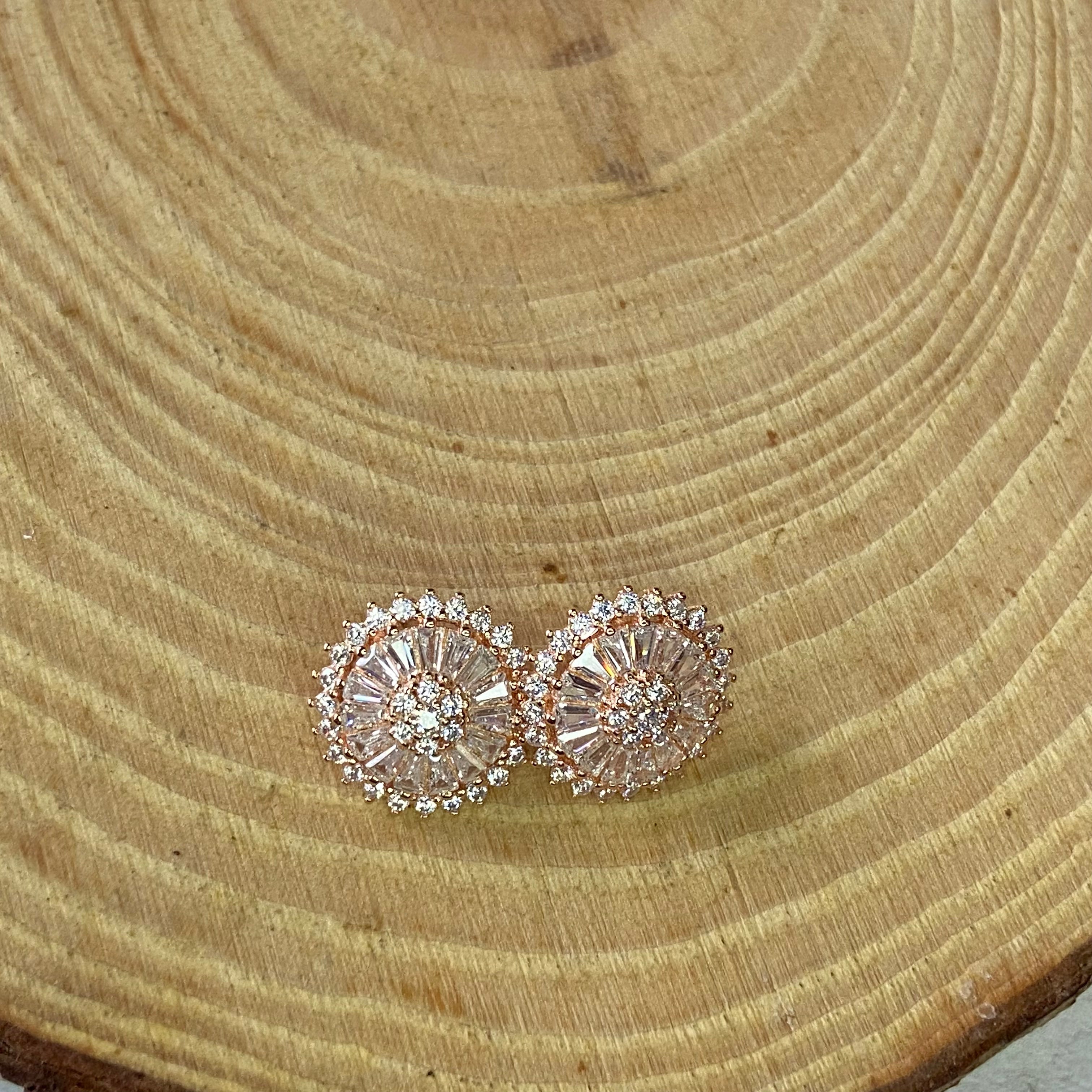 In 925 sterling silver with 18k Rose gold