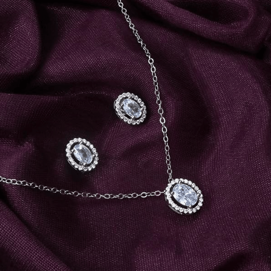 Halo oval cut diamond pendant set