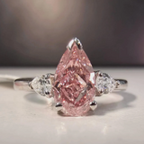 WOKE EXCLUSIVE| 3 CT PEAR CUT PINK MOISSANITE RING