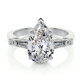 8 Ct Pear cut baugette side moissanite ring | 9K gold
